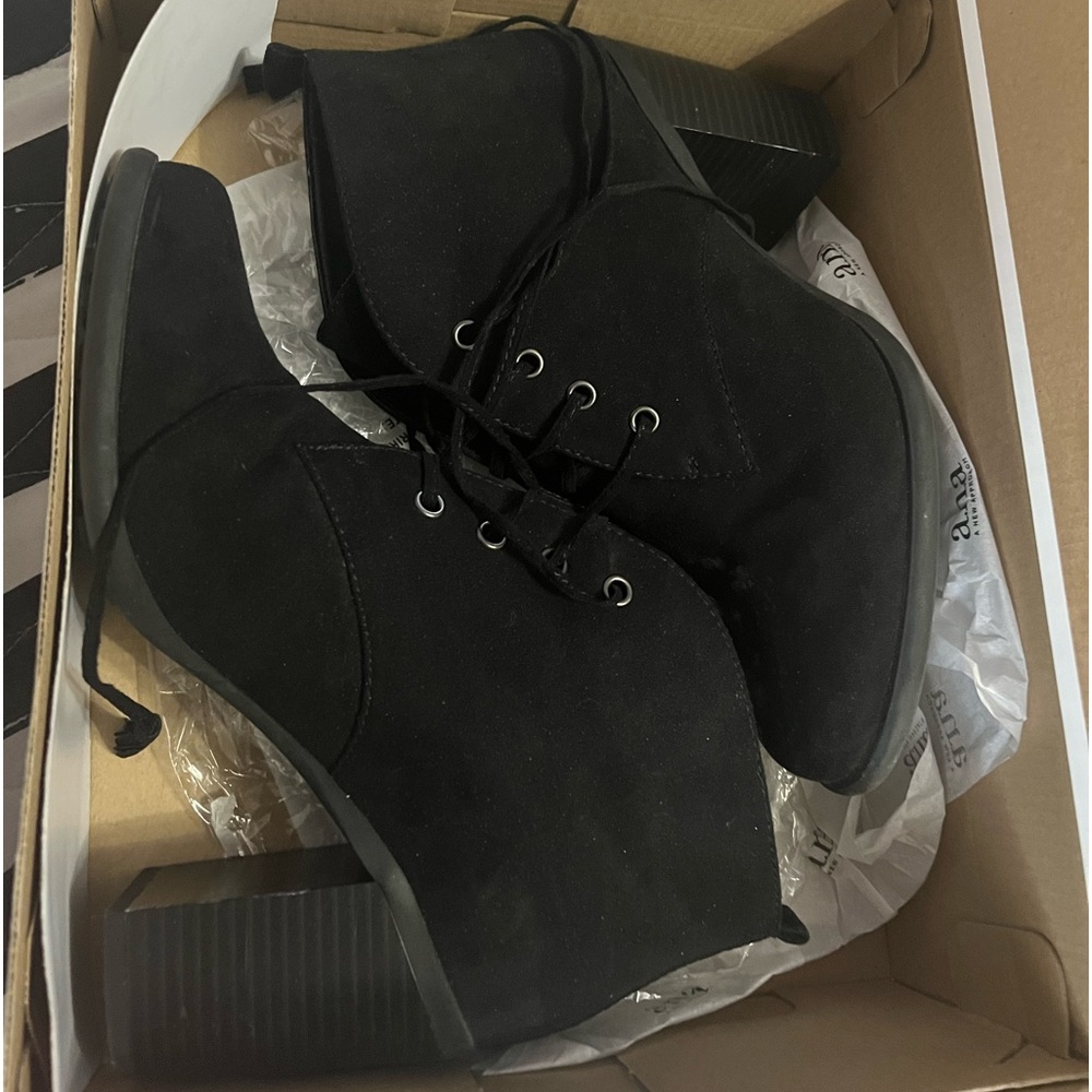 Black lace up heeled boots